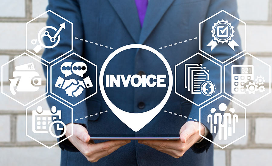 The invoicing concept – a man holding a tablet and the word invoice written above it​