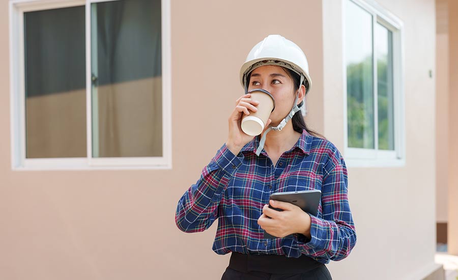 An FHA inspector documenting inspection findings​