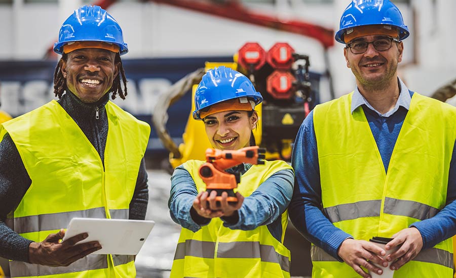 Smiling workers in a factory